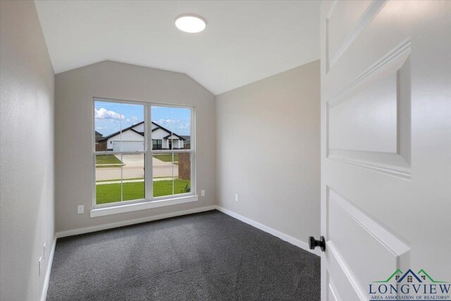 16226 Crossing Cir, Lindale, TX 75771 - interior space featuring baseboards, dark colored carpet, and lofted ceiling