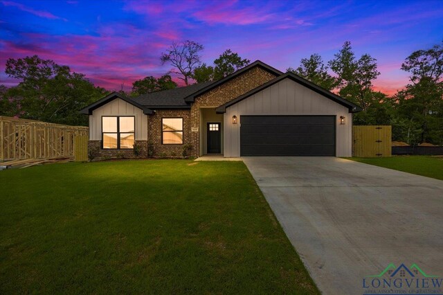 16226 Crossing Cir, Lindale, TX 75771 - modern farmhouse style home featuring a garage, fence, a front yard, and concrete driveway