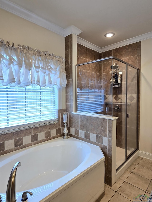3720 Bill Owens Pkwy, Longview, TX 75605 - full bath with crown molding, a stall shower, tile patterned floors, and a garden tub