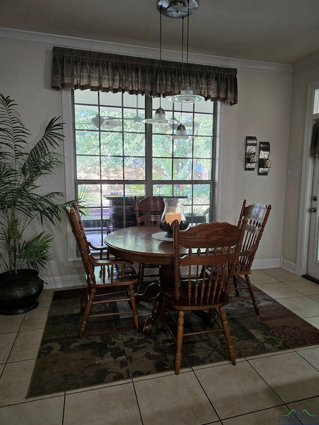 3720 Bill Owens Pkwy, Longview, TX 75605 - dining room featuring ornamental molding, light tile patterned floors, and healthy amount of natural light