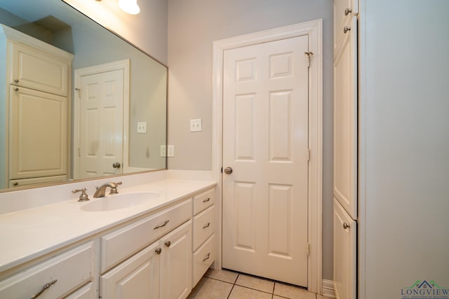 bathroom featuring tile patterned floors and vanity