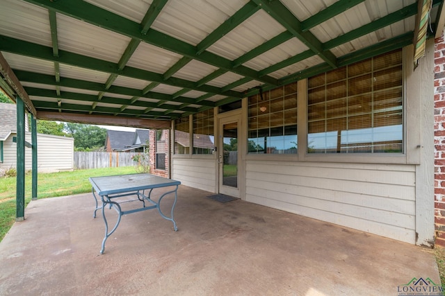 view of patio / terrace featuring an outbuilding