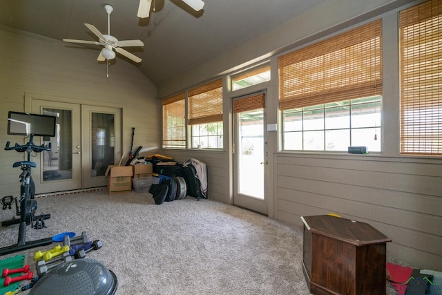 sunroom / solarium with french doors, ceiling fan, vaulted ceiling, and a wealth of natural light