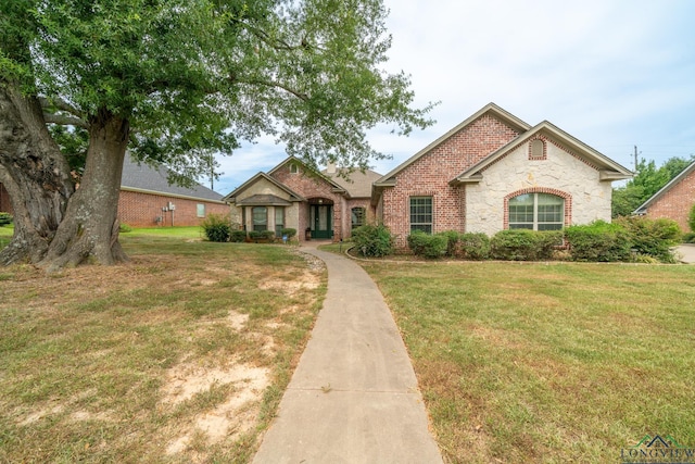 view of front of house with a front yard