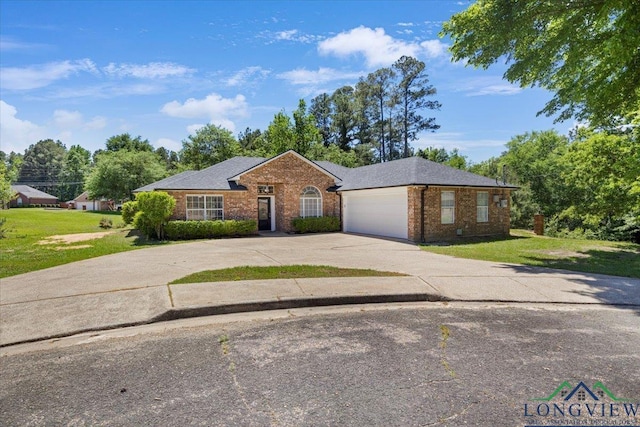 ranch-style house featuring brick siding, concrete driveway, a front yard, a garage, and roof with shingles