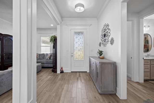 113 Saddle Brook Cir, Hallsville, TX 75650 - foyer featuring crown molding and light wood-style floors