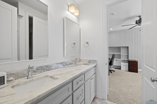 113 Saddle Brook Cir, Hallsville, TX 75650 - bathroom with double vanity and a ceiling fan