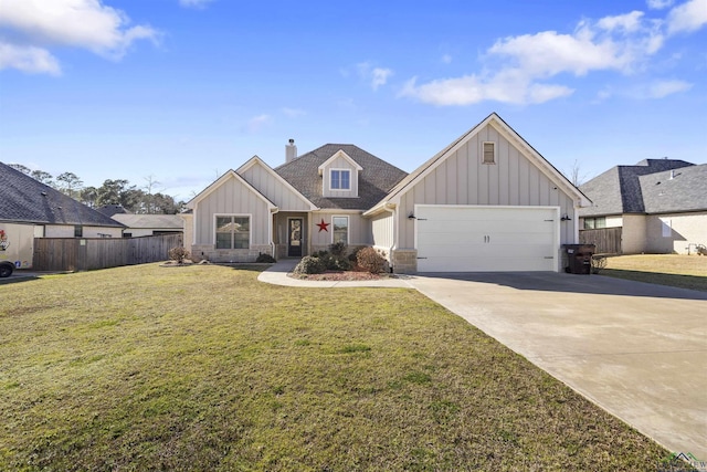 113 Saddle Brook Cir, Hallsville, TX 75650 - view of front of home with board and batten siding, a chimney, driveway, and an attached garage