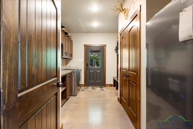 15136 Fm 852, Gilmer, TX 75644 - laundry area featuring cabinet space, washing machine and dryer, and recessed lighting