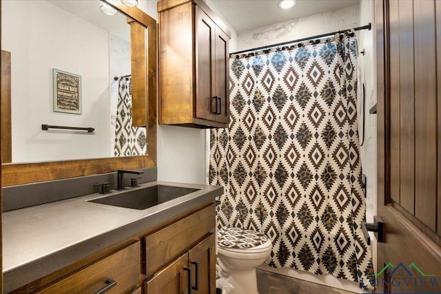 15136 Fm 852, Gilmer, TX 75644 - bathroom featuring vanity, curtained shower, and recessed lighting