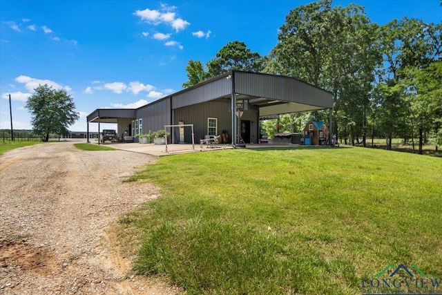 15136 Fm 852, Gilmer, TX 75644 - back of property featuring a yard