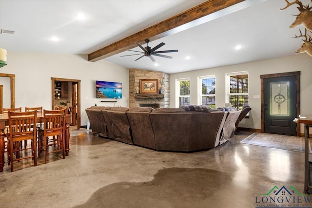 15136 Fm 852, Gilmer, TX 75644 - living room featuring concrete floors, ceiling fan, recessed lighting, and a stone fireplace