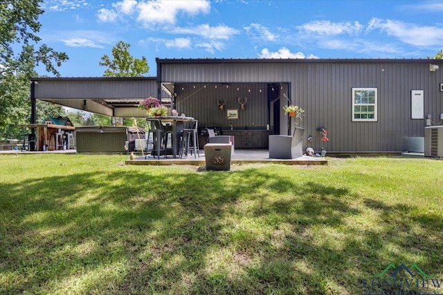 15136 Fm 852, Gilmer, TX 75644 - back of house featuring a yard