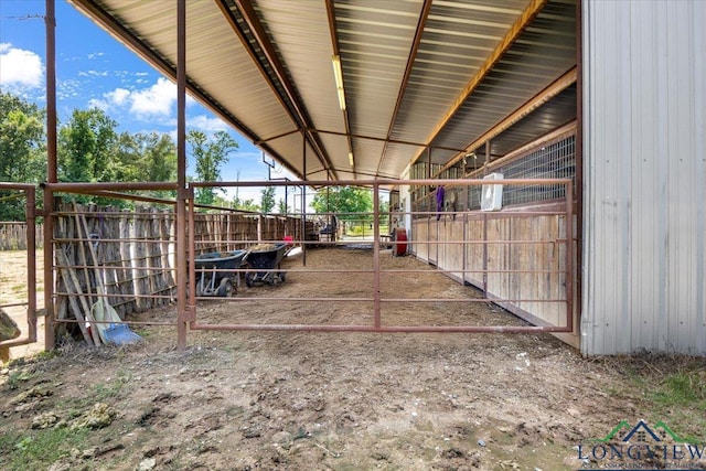 15136 Fm 852, Gilmer, TX 75644 - view of patio featuring an exterior structure and an outbuilding