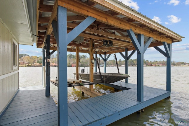 dock area with a water view