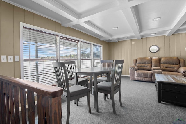 dining room with beamed ceiling, carpet floors, and coffered ceiling