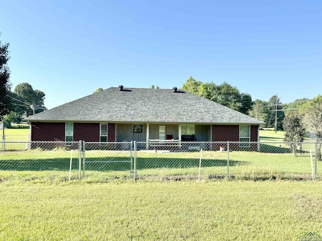 view of front of home featuring a front lawn