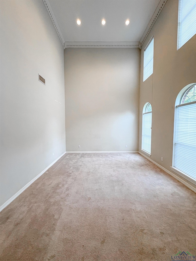 unfurnished room featuring recessed lighting, carpet flooring, and baseboards
