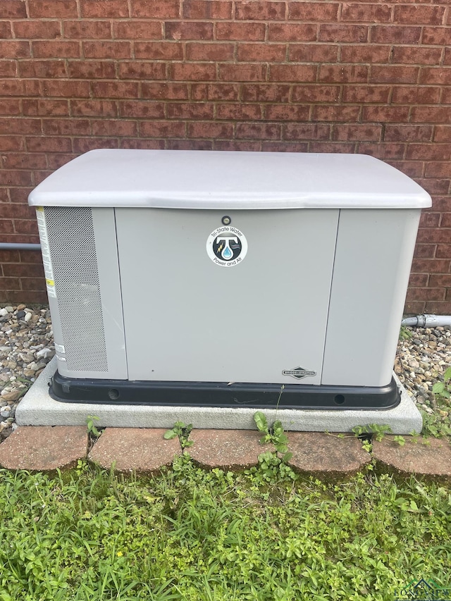 1203 Lesley, Longview, TX 75604 - exterior view of a power unit and brick siding