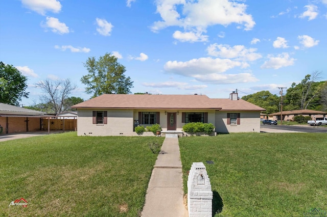 single story home featuring a front yard