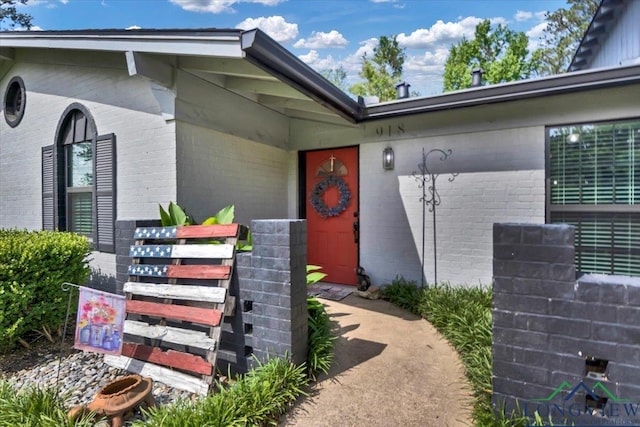 918 S Evenside St, Henderson, TX 75654 - doorway to property featuring brick siding