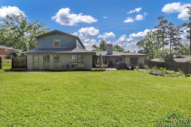 918 S Evenside St, Henderson, TX 75654 - back of house featuring a chimney, central AC unit, and a shingled roof