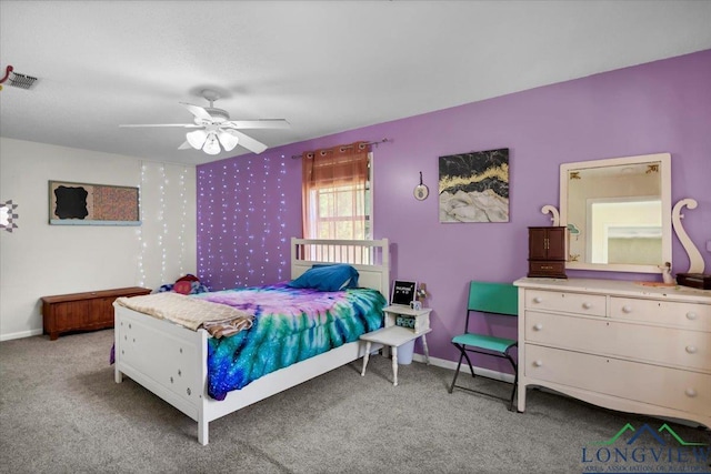 918 S Evenside St, Henderson, TX 75654 - bedroom with carpet, baseboards, and a ceiling fan