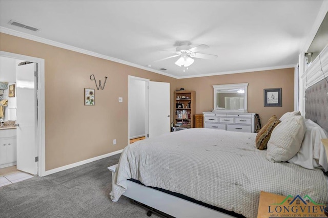 918 S Evenside St, Henderson, TX 75654 - bedroom with ornamental molding, baseboards, carpet flooring, a ceiling fan, and connected bathroom