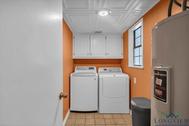 918 S Evenside St, Henderson, TX 75654 - laundry area featuring cabinet space, washer and clothes dryer, light tile patterned flooring, an ornate ceiling, and baseboards