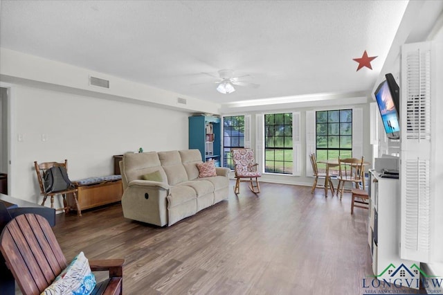 918 S Evenside St, Henderson, TX 75654 - living room featuring ceiling fan and wood finished floors