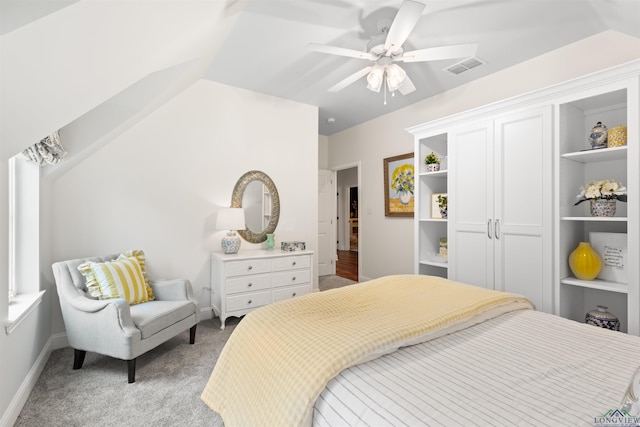 1307 Yates Dr, Longview, TX 75601 - bedroom with light carpet, ceiling fan, baseboards, and lofted ceiling