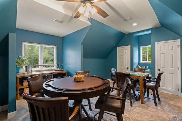 1307 Yates Dr, Longview, TX 75601 - dining room with carpet, ceiling fan, and lofted ceiling