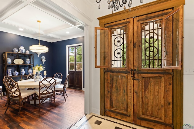 1307 Yates Dr, Longview, TX 75601 - dining room featuring coffered ceiling, ornamental molding, baseboards, wood finished floors, and beam ceiling