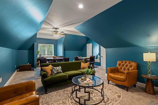 1307 Yates Dr, Longview, TX 75601 - carpeted living room featuring lofted ceiling, a ceiling fan, and baseboards