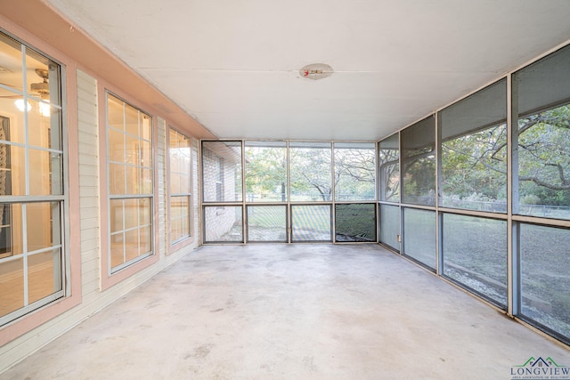 unfurnished sunroom with a wealth of natural light