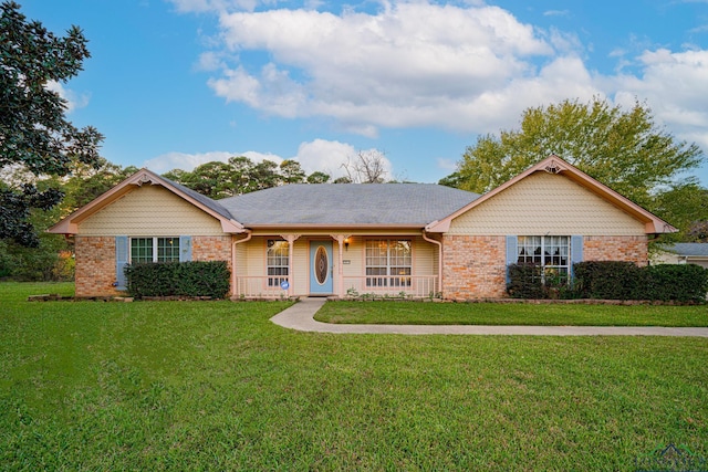 ranch-style house with a front yard