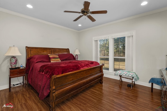 bedroom featuring ornamental molding, dark hardwood / wood-style floors, and ceiling fan