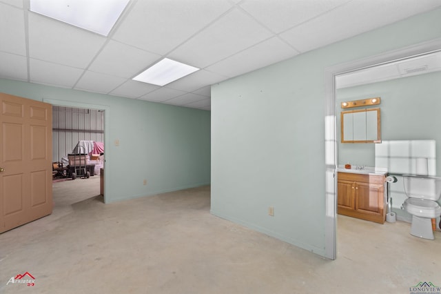 interior space featuring a paneled ceiling