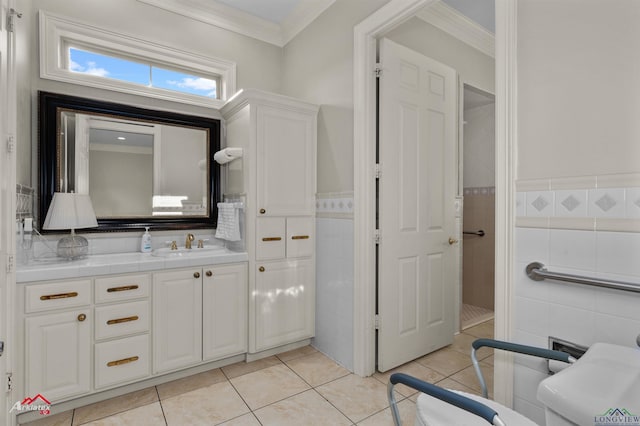 bathroom featuring ornamental molding, tile walls, tile patterned flooring, and vanity