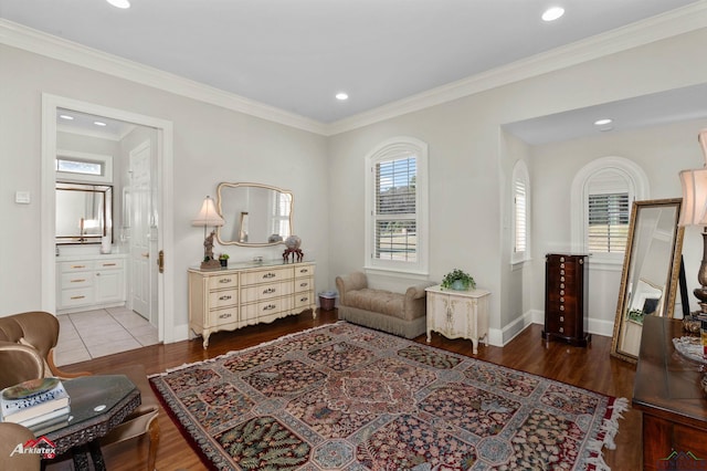 sitting room featuring hardwood / wood-style flooring and crown molding