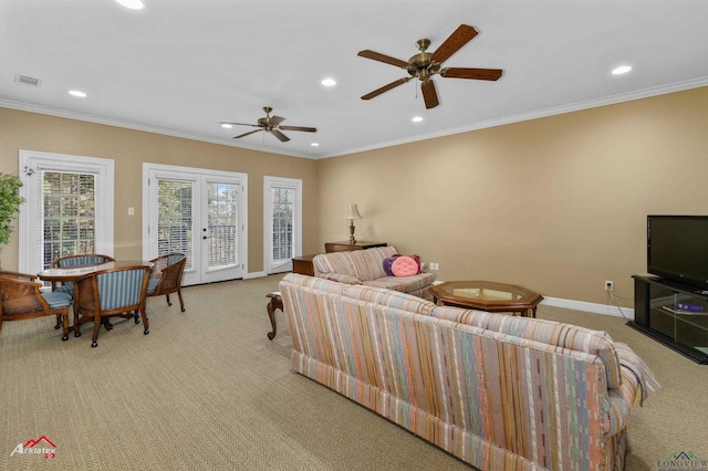 carpeted living room featuring french doors, ceiling fan, and ornamental molding