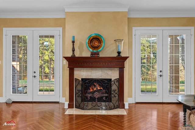 living room with french doors, crown molding, and parquet floors