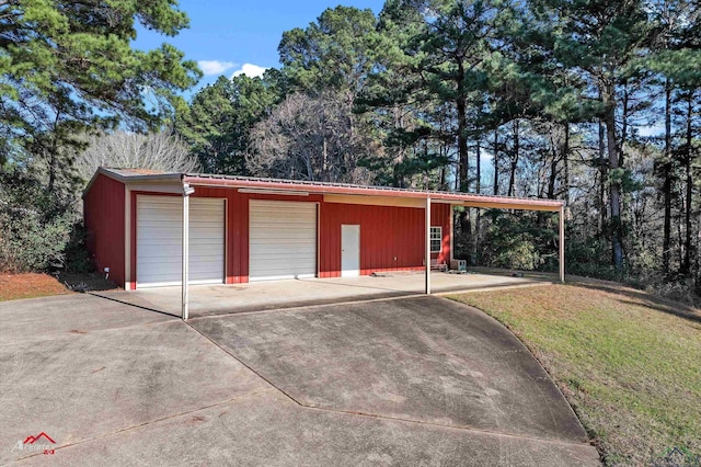 garage featuring a yard