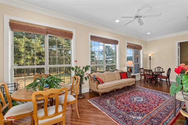 sunroom / solarium with ceiling fan