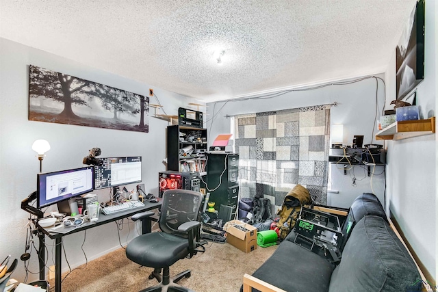 carpeted home office featuring a textured ceiling