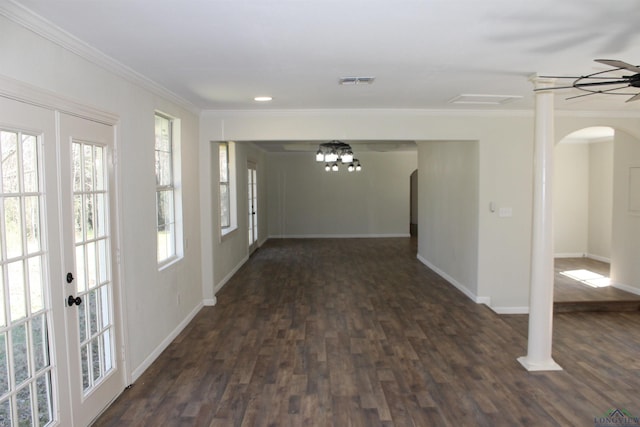 entryway featuring dark wood-style floors, baseboards, visible vents, and ornamental molding