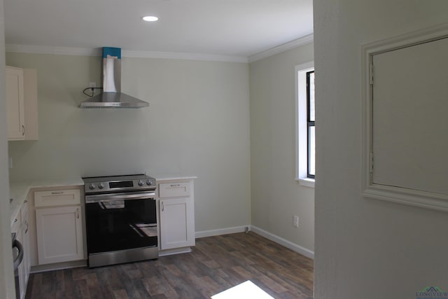 kitchen with white cabinets, light countertops, electric range, and wall chimney exhaust hood