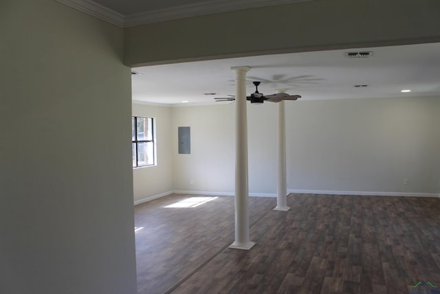 unfurnished room with decorative columns, baseboards, ceiling fan, ornamental molding, and wood finished floors