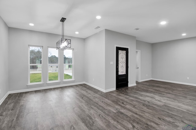 interior space featuring dark wood-style floors, baseboards, and recessed lighting