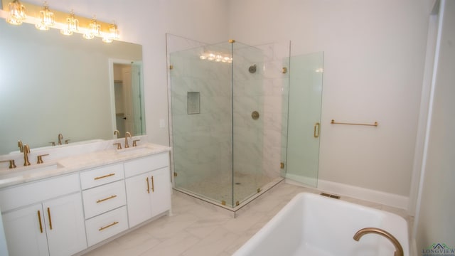 bathroom with vanity and separate shower and tub